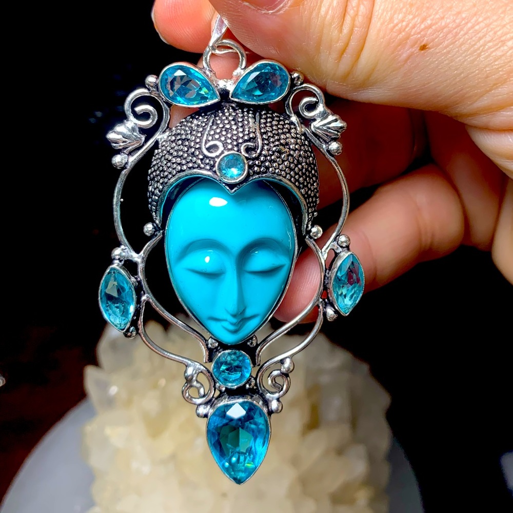 Goddess and topaz pendant